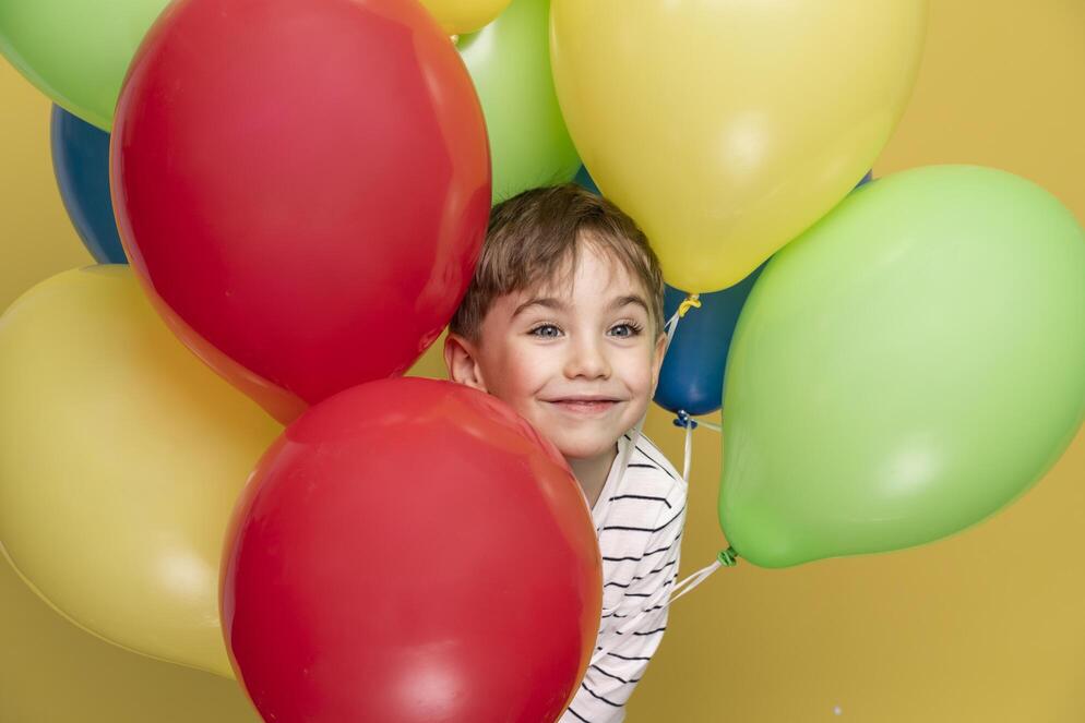 smiley little boy celebrating birthday